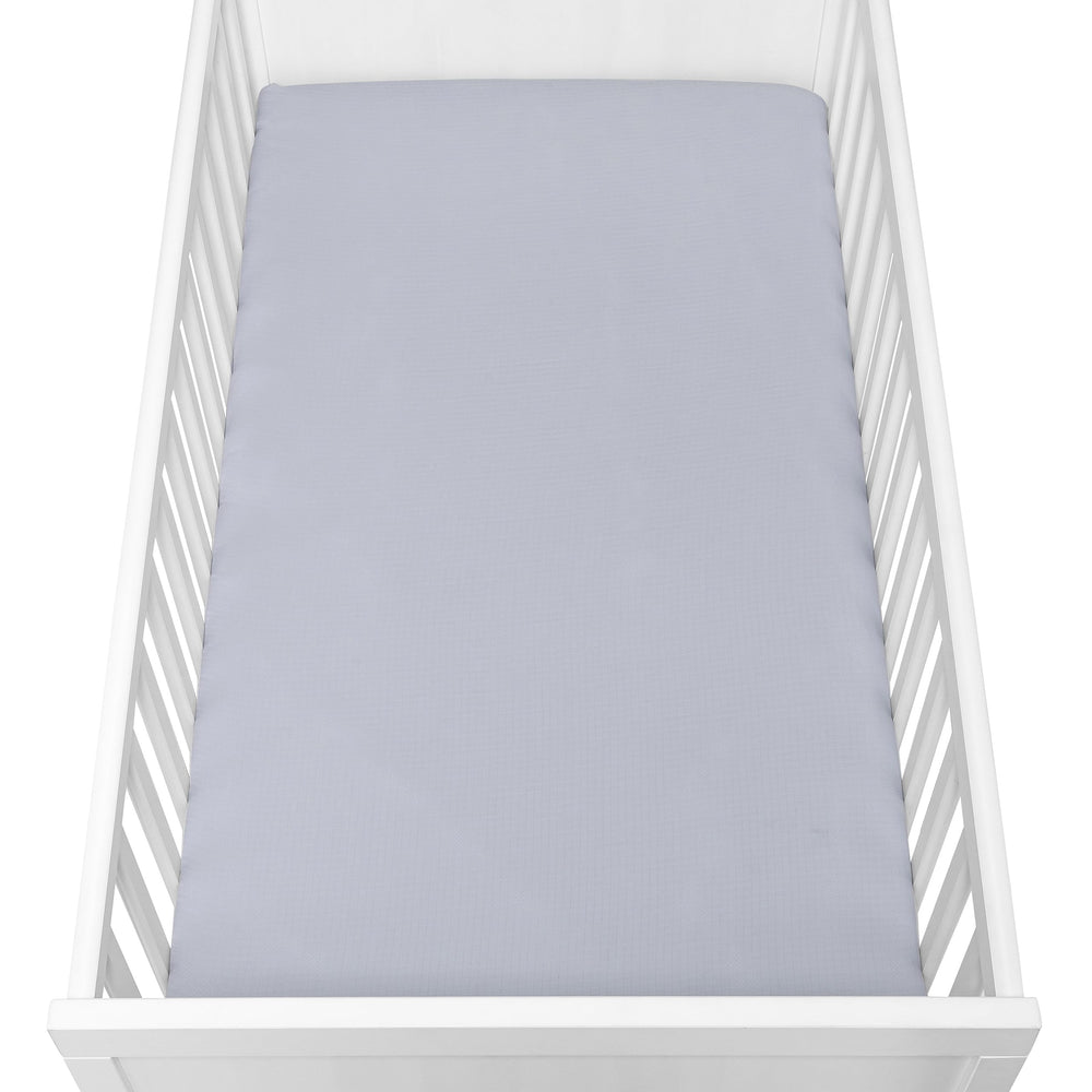 Newton Baby Twilight Grey color option shown complements modern nurseries and décor