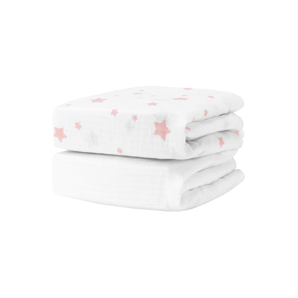 Newton Baby Stardust print blush coral sheet shows breathable organic muslin for peaceful sleep