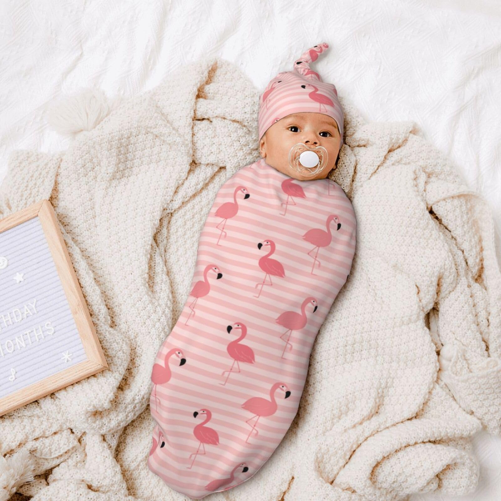 Nezweld Flamingo swaddle blanket close-up highlights gentle weave and texture.