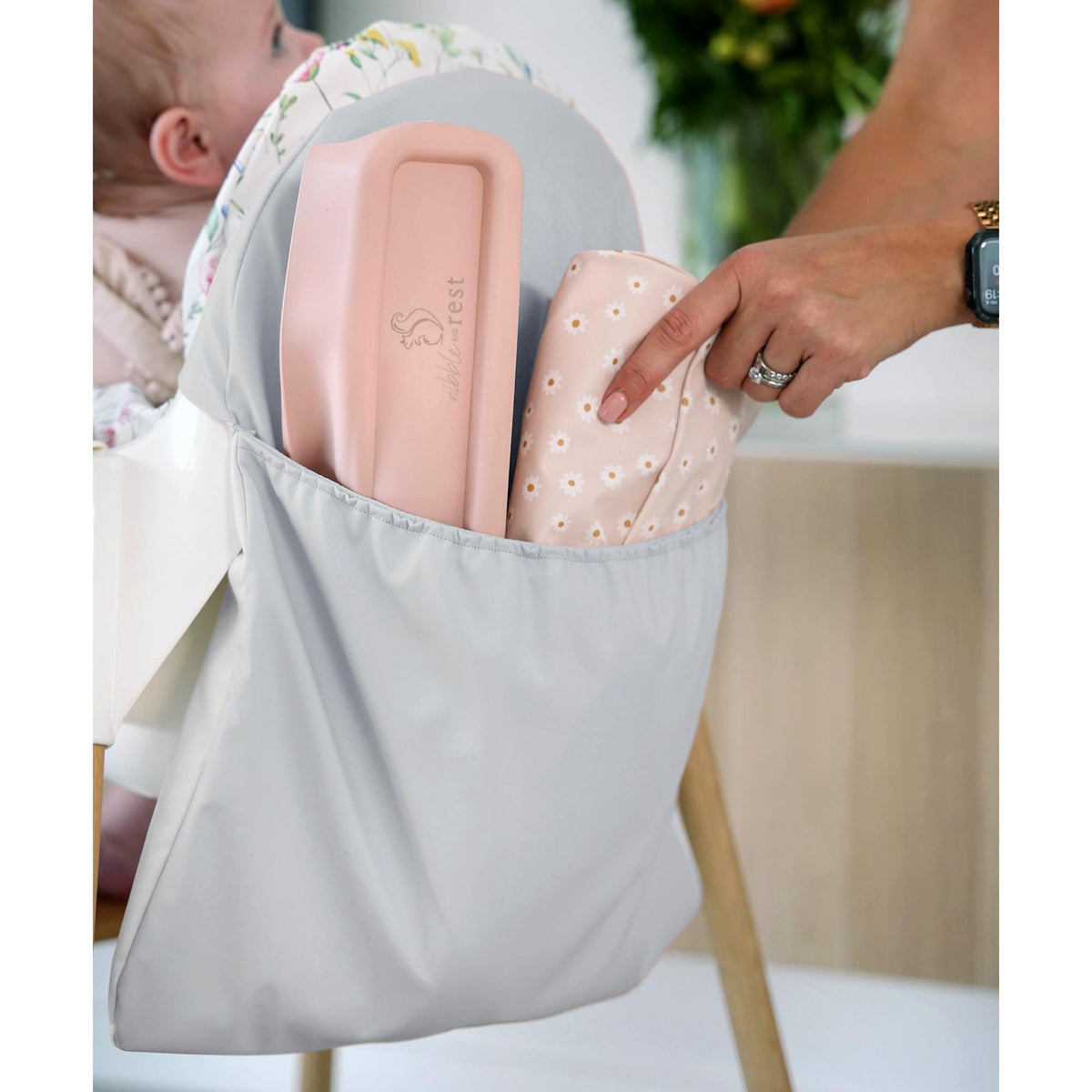 Nibble and Rest highchair pocket back-fit secures neatly at the Antilop chair for easy access