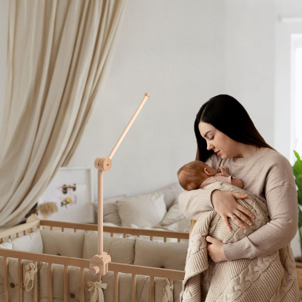 NICEMER crib arm compatibility helps secure it to strollers with suitable rails.
