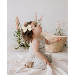 Niceye fabric closeup shows soft cotton-linen bows for newborn comfort