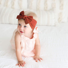 Niceye baby girls headband with turquoise bow, bright outfit detail for outdoor events