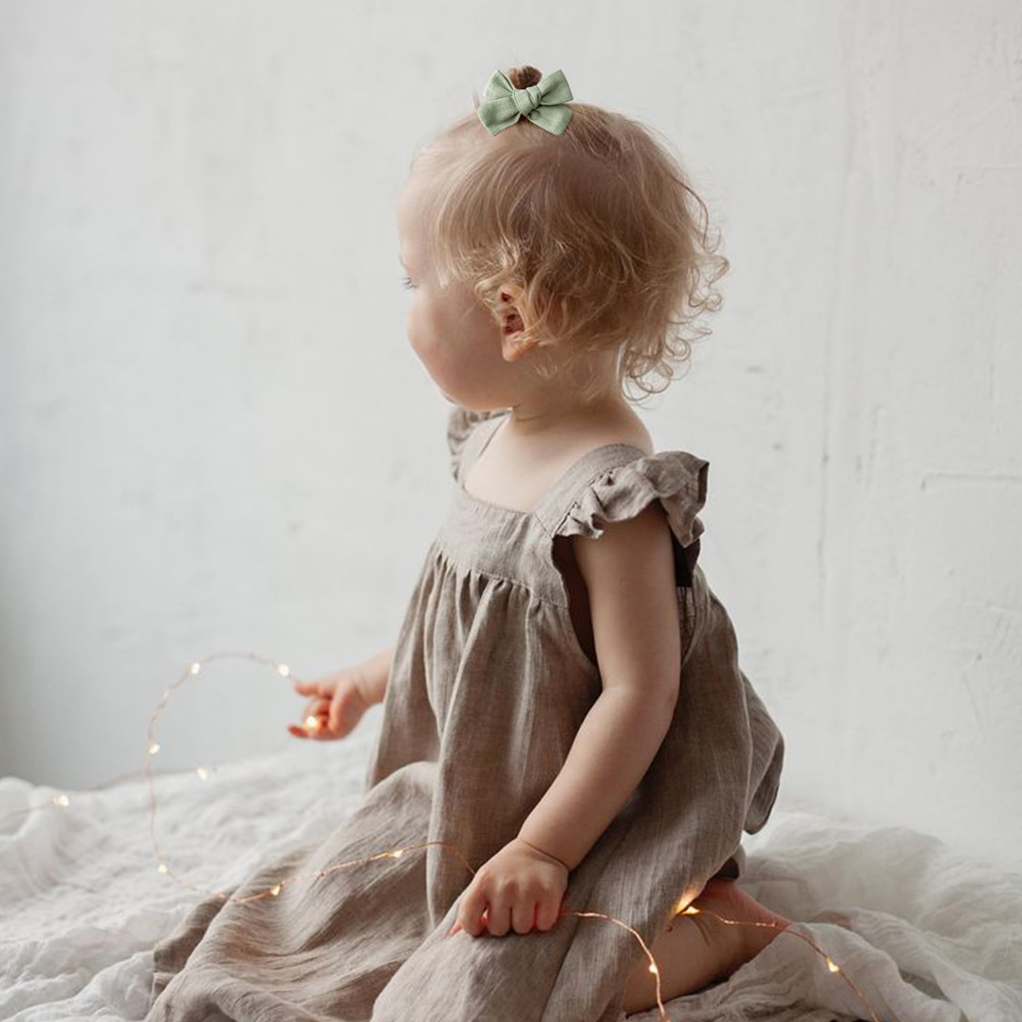 Niceye hair clips on a child at a birthday party.