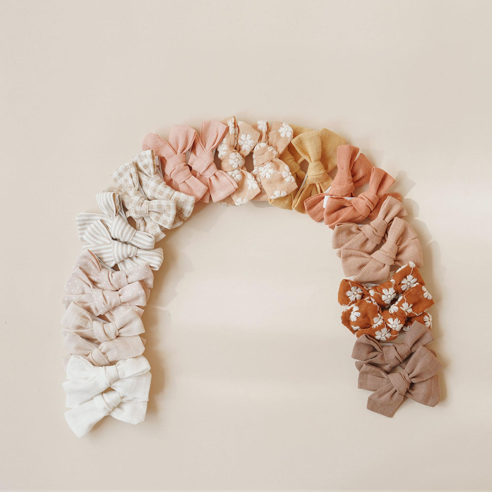 Niceye bows in action brighten ponytails and braids with secure placement