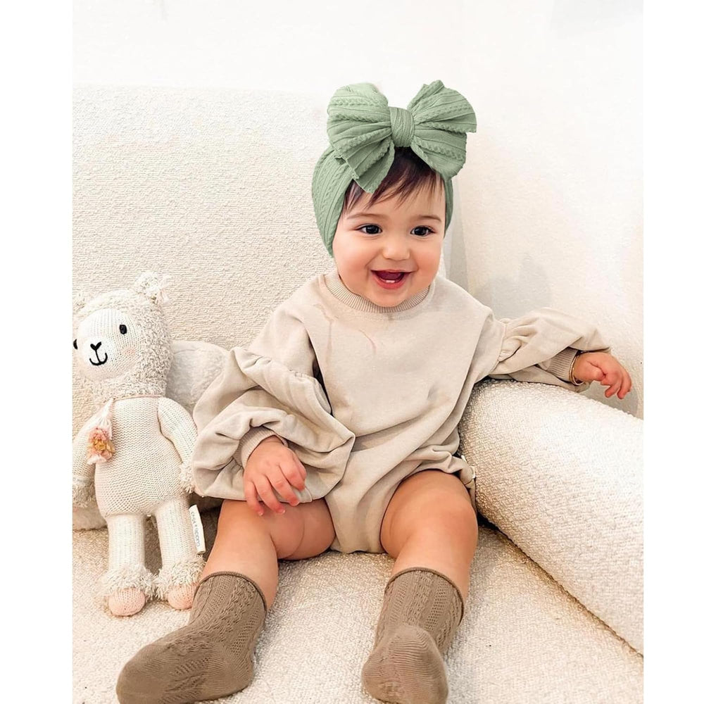 Niceye baby headband bow black adds chic style with wide, comfortable band.