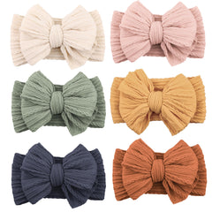 Niceye baby headbands nylon stretch closeup shows soft, breathable fabric for newborn comfort.