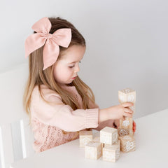 Niceye Fable bows fabric closeup emphasizes soft cotton-linen texture