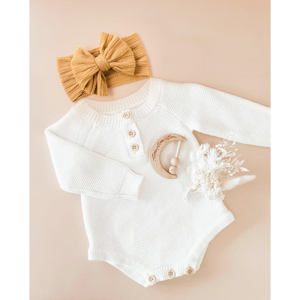 Niceye headbands worn on a baby in use image demonstrates secure fit during everyday activities.