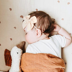 Niceye soft nylon headband provides gentle comfort on baby's head.