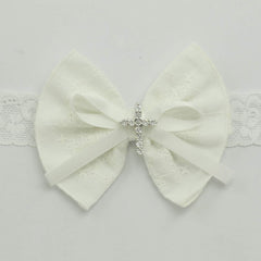 Nihao Baby cross-detail headband ideal for christening moments and family photos.