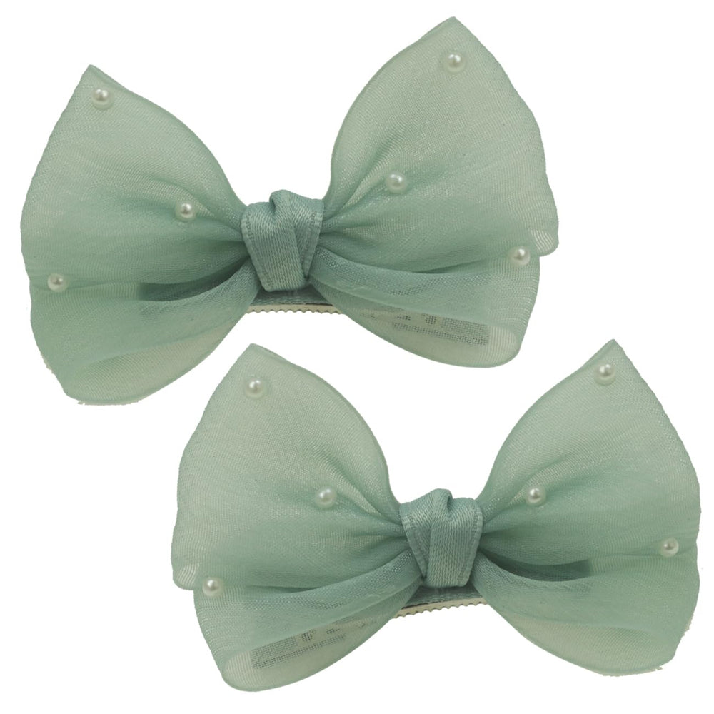 Nihao Baby Pearl Light Green Bow hair clip closeup highlighting glossy pearl accents for chic everyday hairstyles