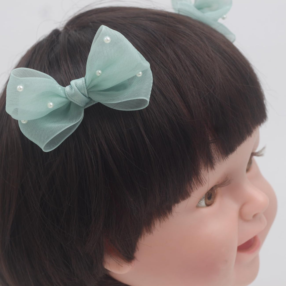 Nihao Baby Pearl Light Green Bow hair clip multi-angle gallery illustrates varied styling options