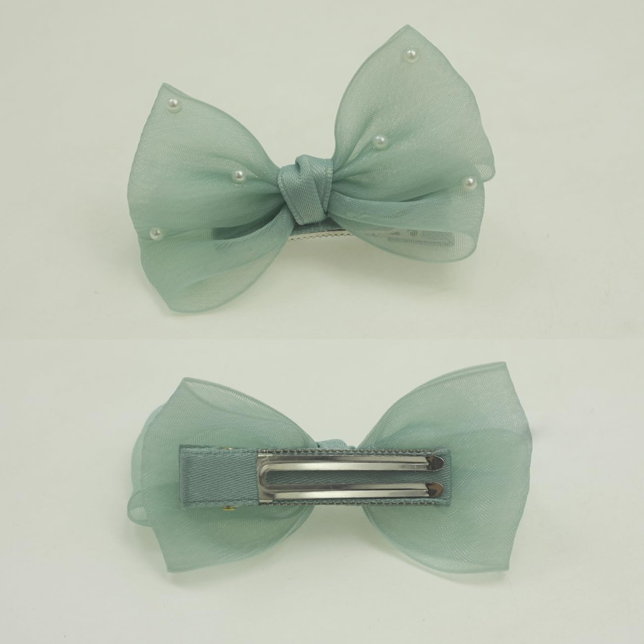 Nihao Baby Pearl Light Green Bow hair clip side view shows elegant silhouette and subtle sparkle