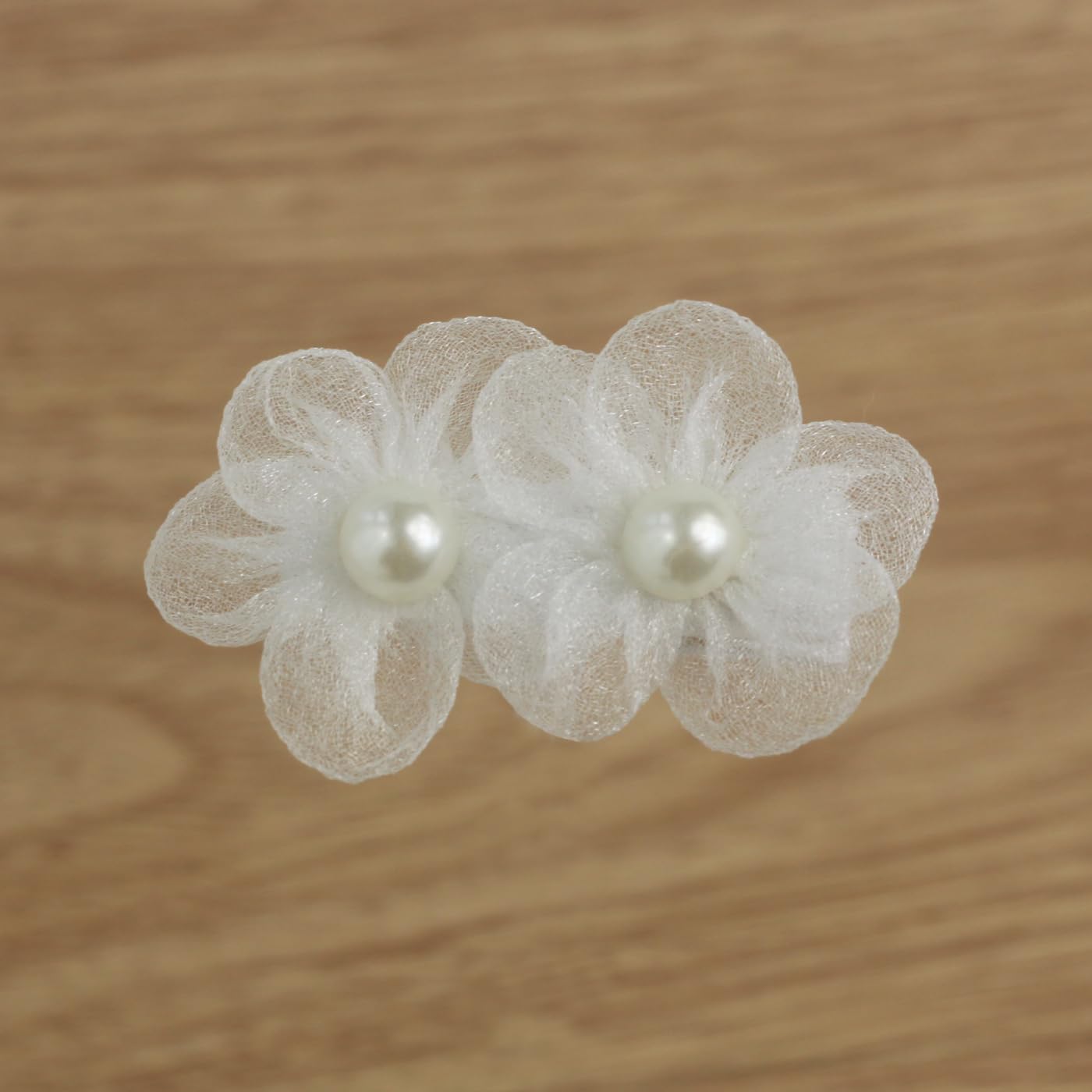 Nihao Baby white bow headband option pairs with clip for coordinated styling