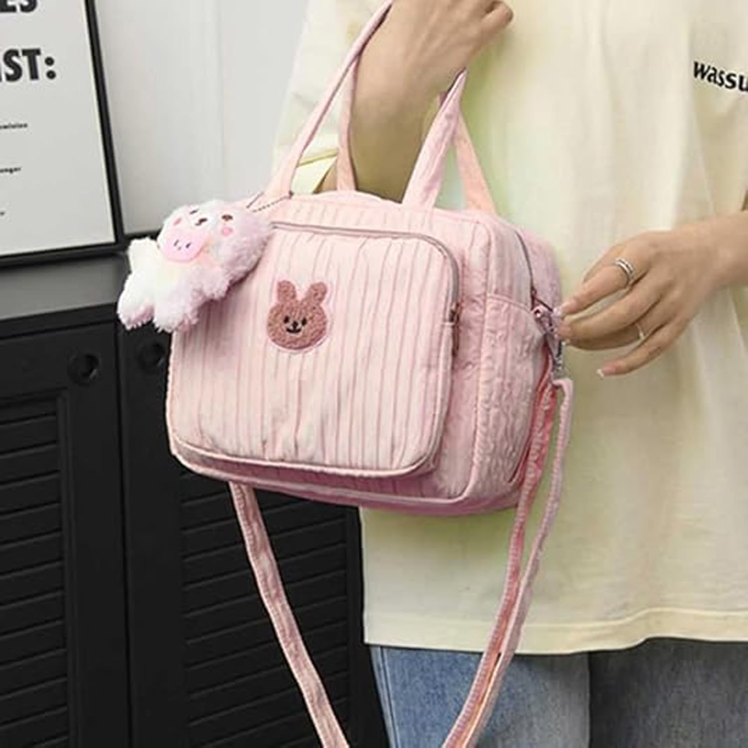 NIKUKY diaper bag tote convertible carry styles illustrate shoulder and crossbody versatility.