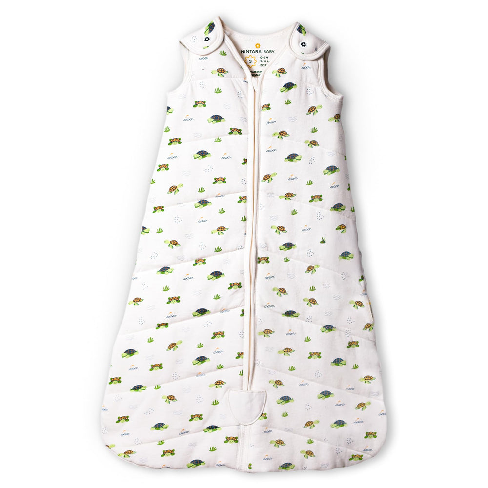 NINTARABABY sleep sack snuggle squad print keeps baby cozy at night.