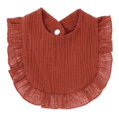 Nishine baby drool bib worn during feeding, convenient.