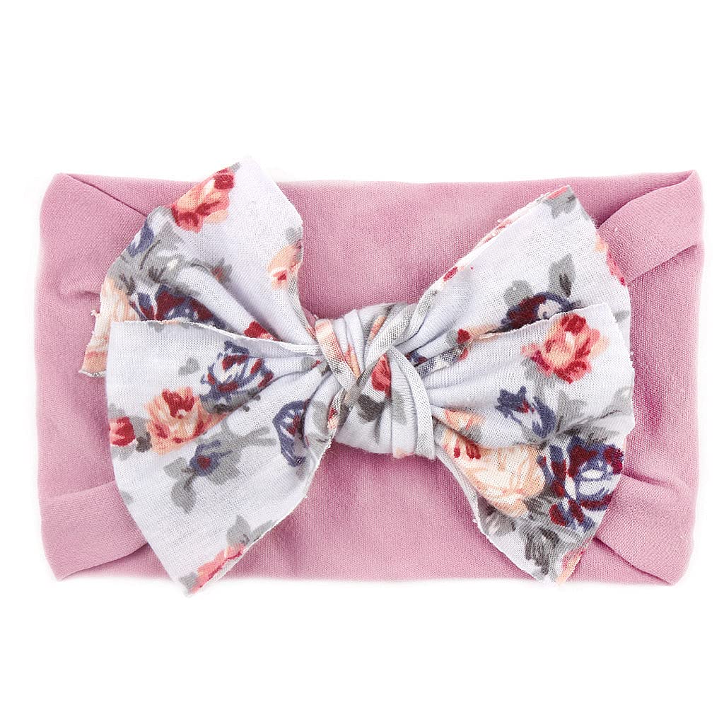 Nishine baby headbands used as photo props to capture adorable moments.