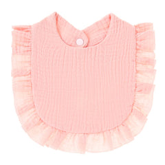 Nishine bib soft cotton texture emphasizing gentle touch for baby's skin.