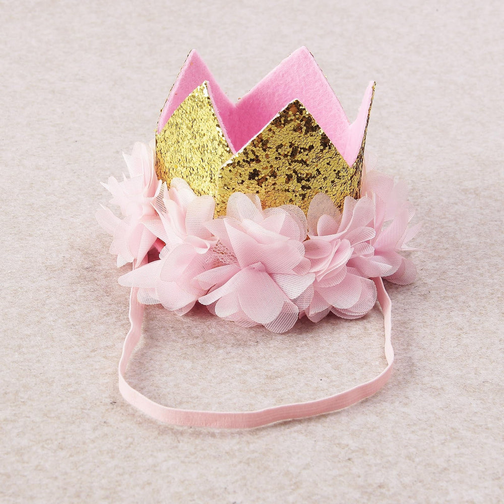 Nishine glitter crown headband worn by child during outdoor birthday outing