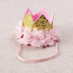 Nishine glitter crown headband worn by child during outdoor birthday outing