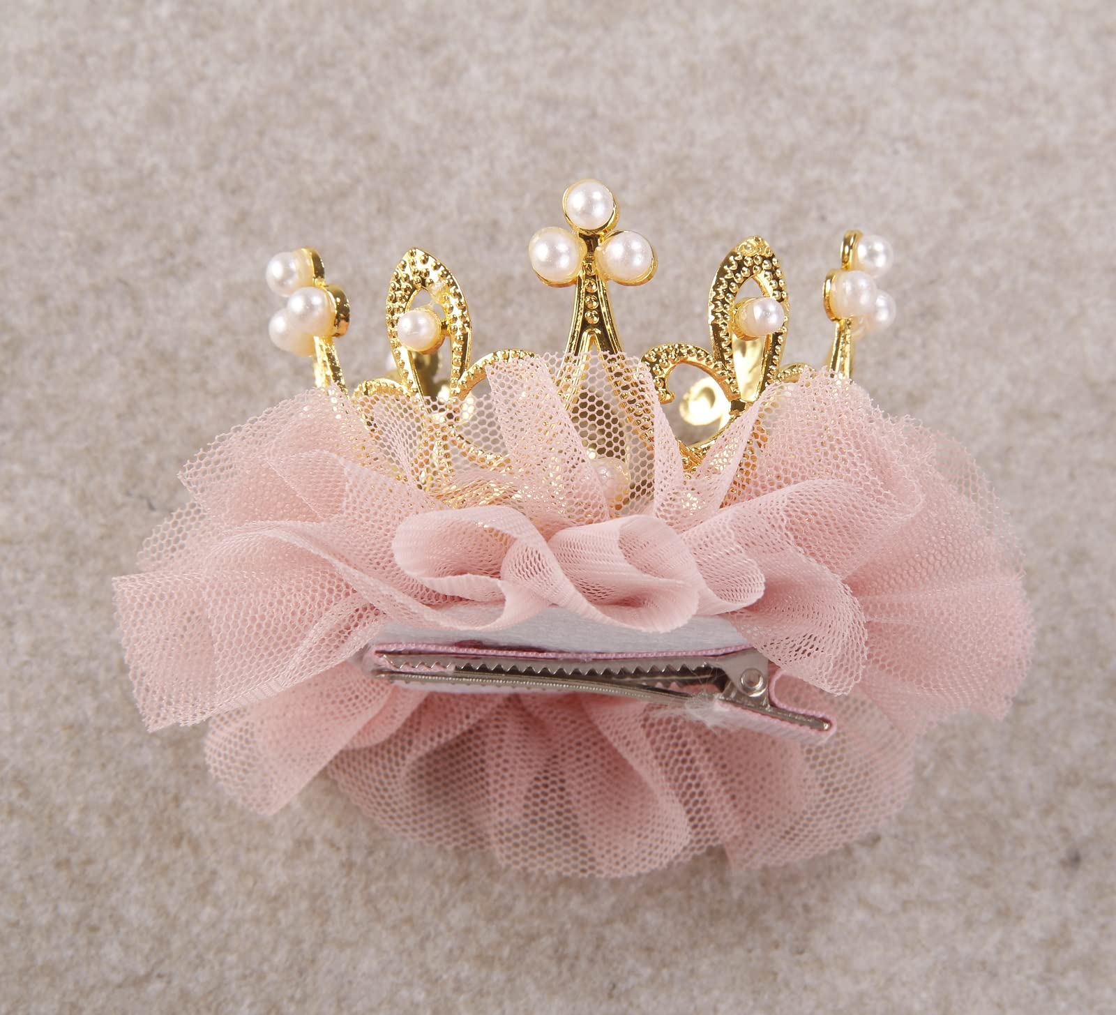 Nishine kids crown hairclip worn with outfits for cute portraits.