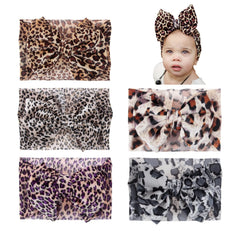 Nishine soft stretchy baby headband providing gentle hold and comfort