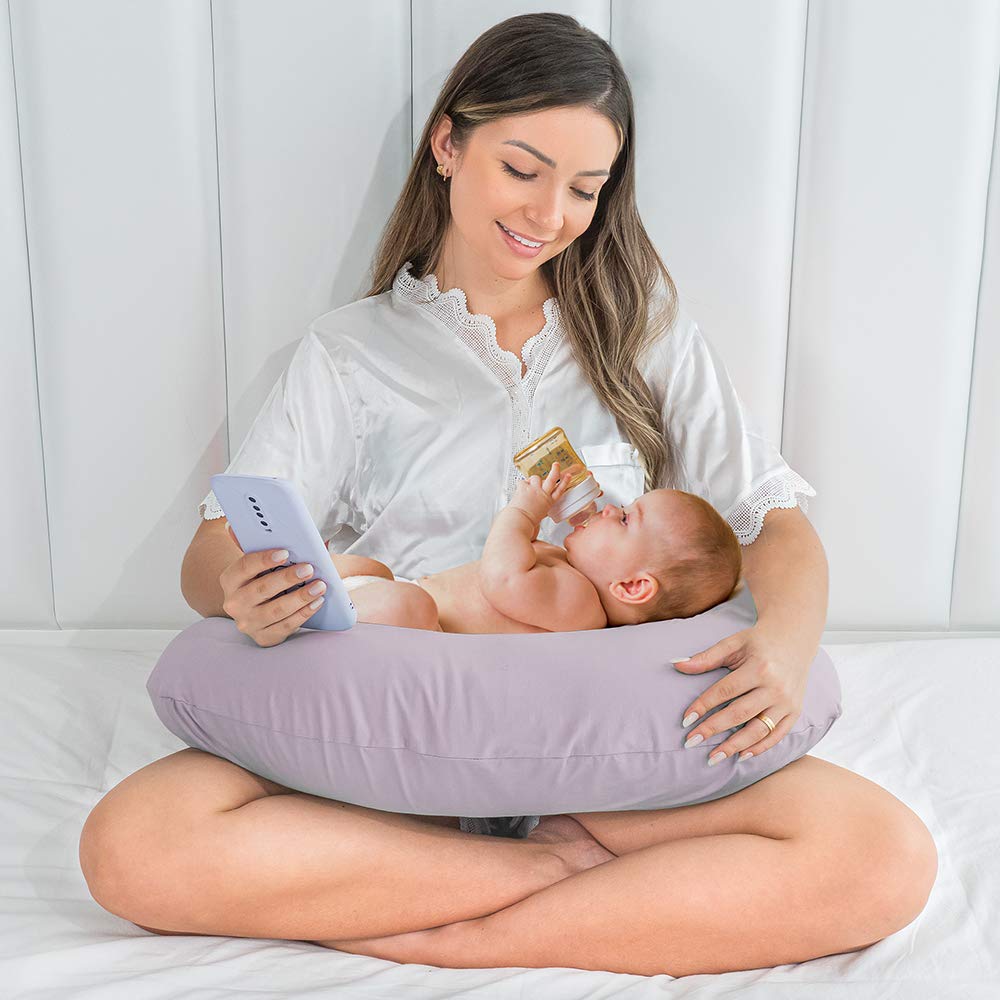 NiSleep pillow used in bed, crib, or car seat for feeding flexibility