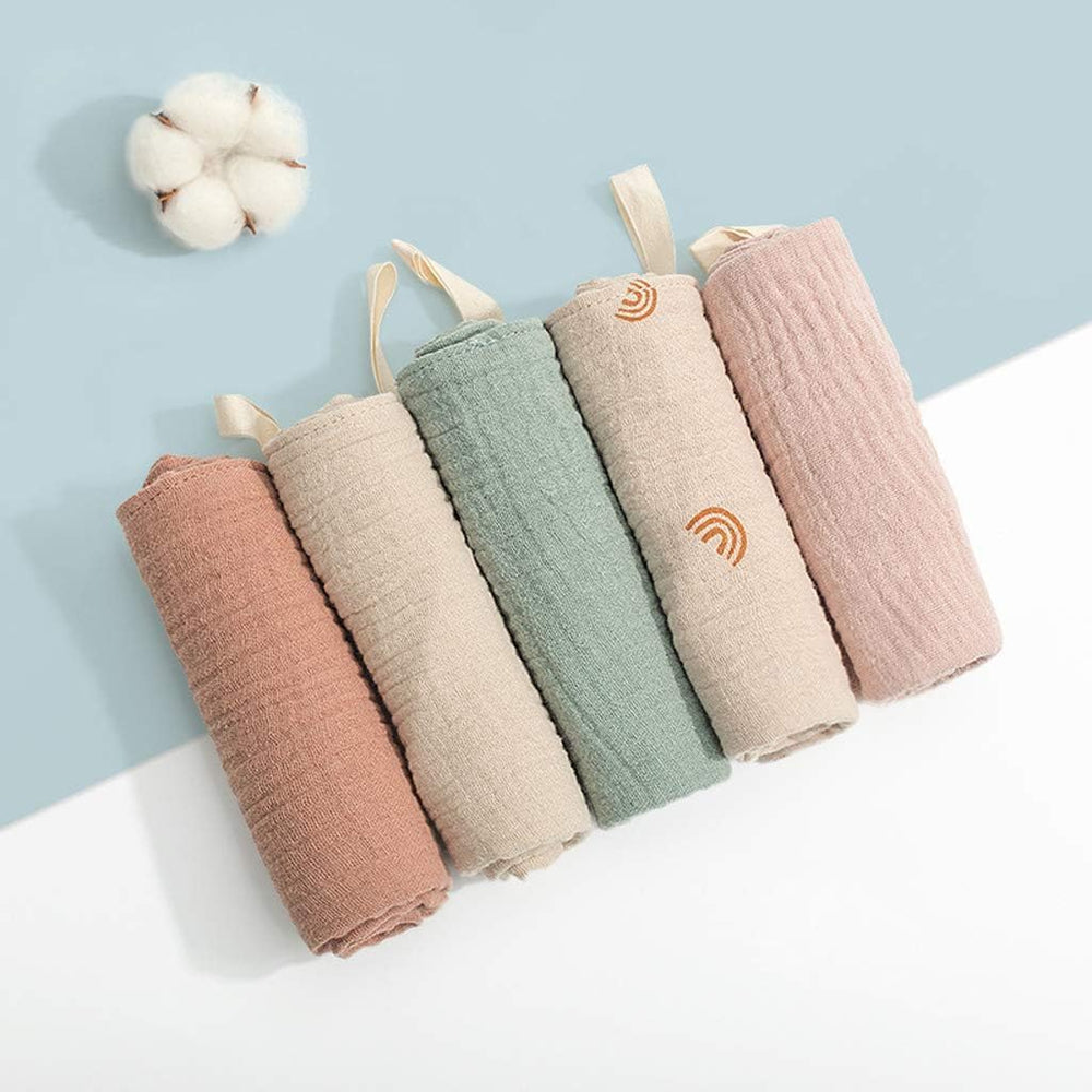 Nisstiiv baby care kit with five-pack washcloths and burp cloths.