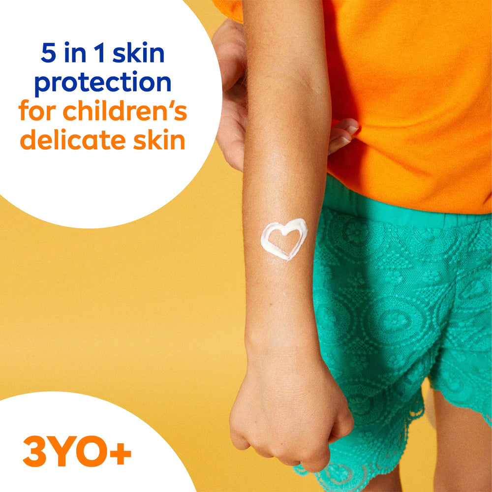 Close-up of Nivea Sun Kids lotion texture showing creamy, non-greasy feel.