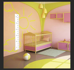 Niwo ART peel-stick application demonstrating easy no-nail setup for kid's room decor