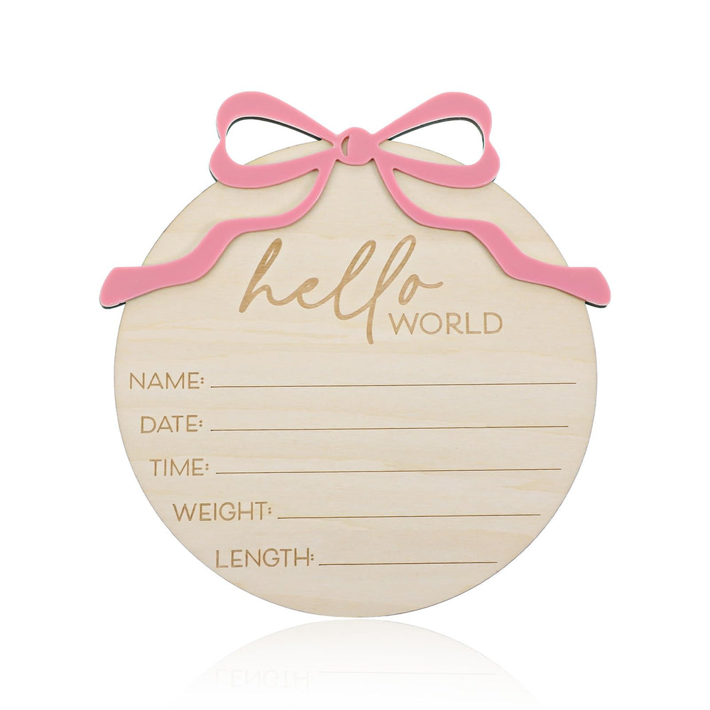 Nogeqi Hello World sign with pink bow serves as a charming baby photo prop keepsake.