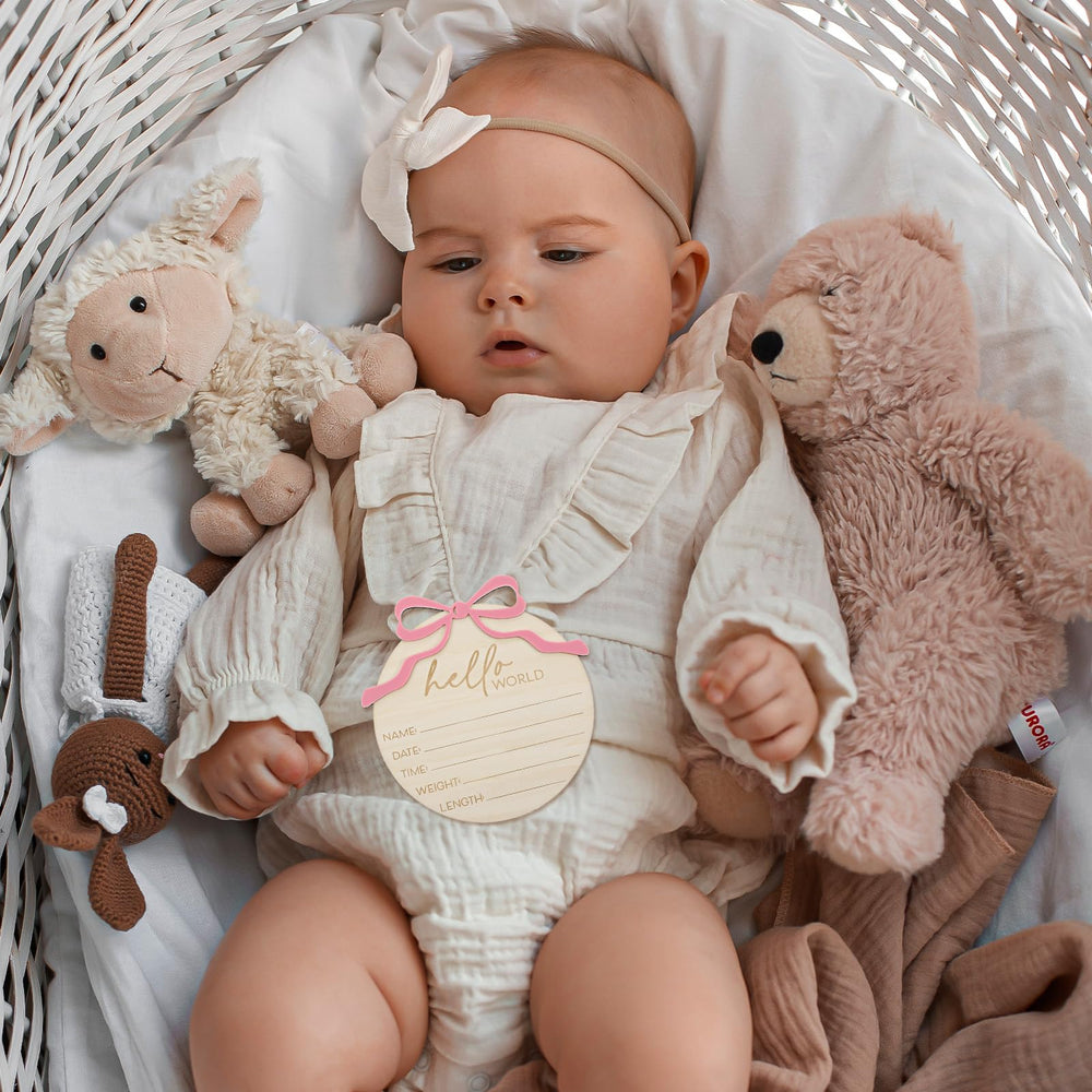 Nogeqi wooden-bow-accent adds gentle charm to nursery decor and photos.