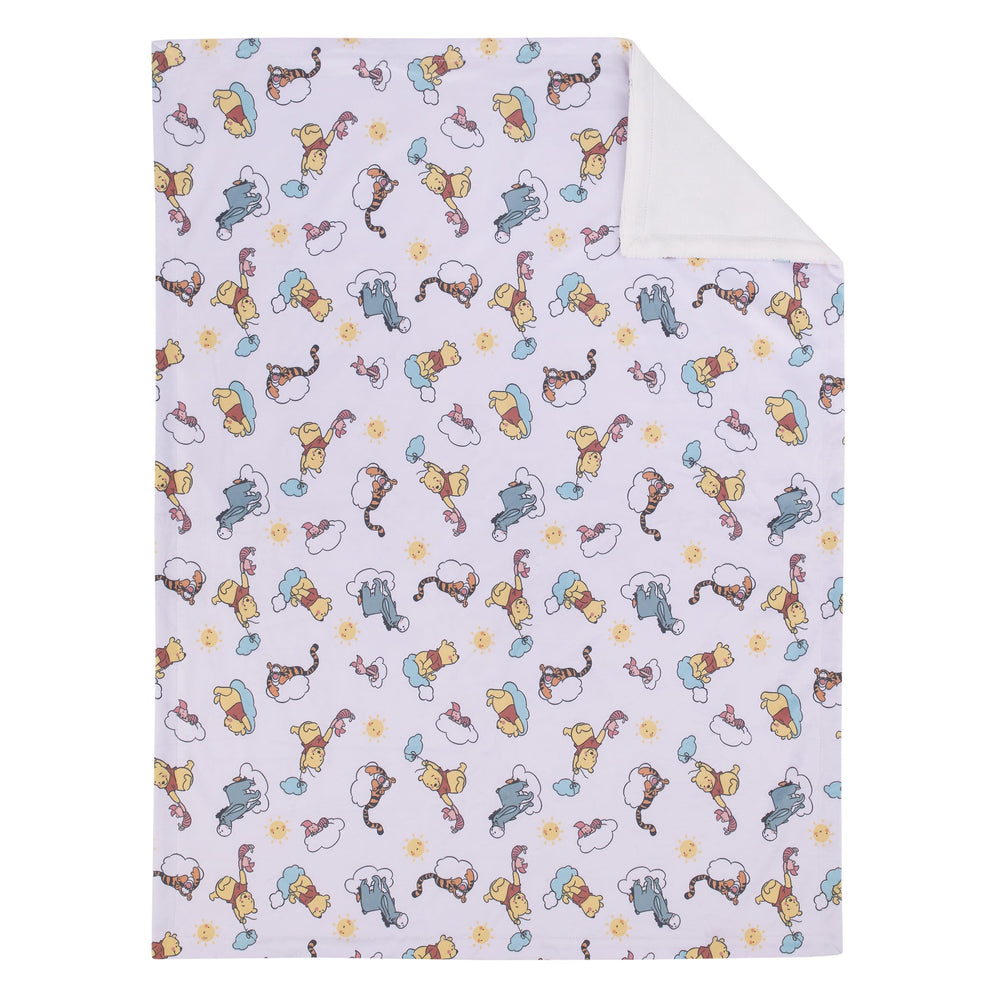 NoJo Disney Winnie the Pooh So Loved blanket reversible print closeup for cozy naps.