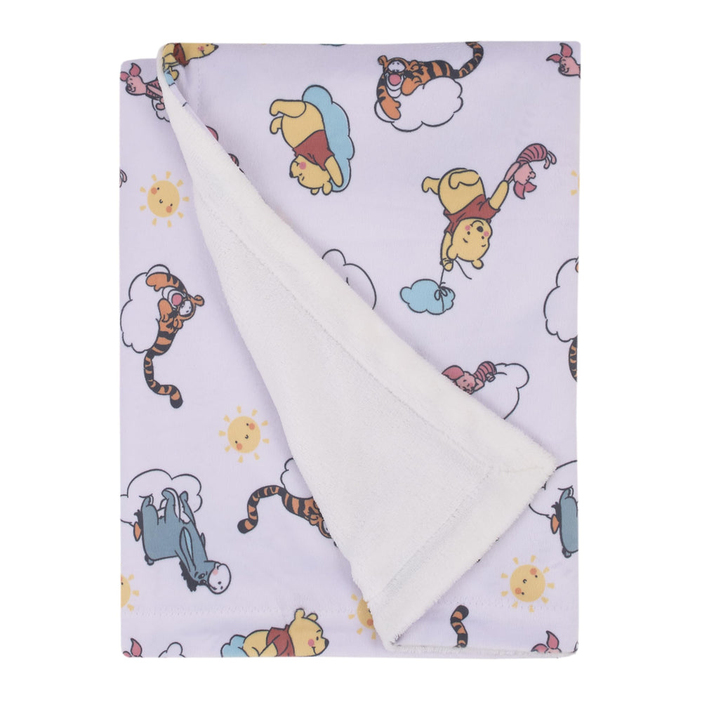 NoJo Disney Pooh print detail highlighting soft fabric for gentle baby skin.