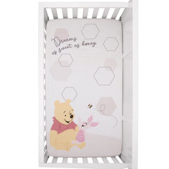 NoJo 100percent cotton crib sheet emphasizing breathable, soft texture