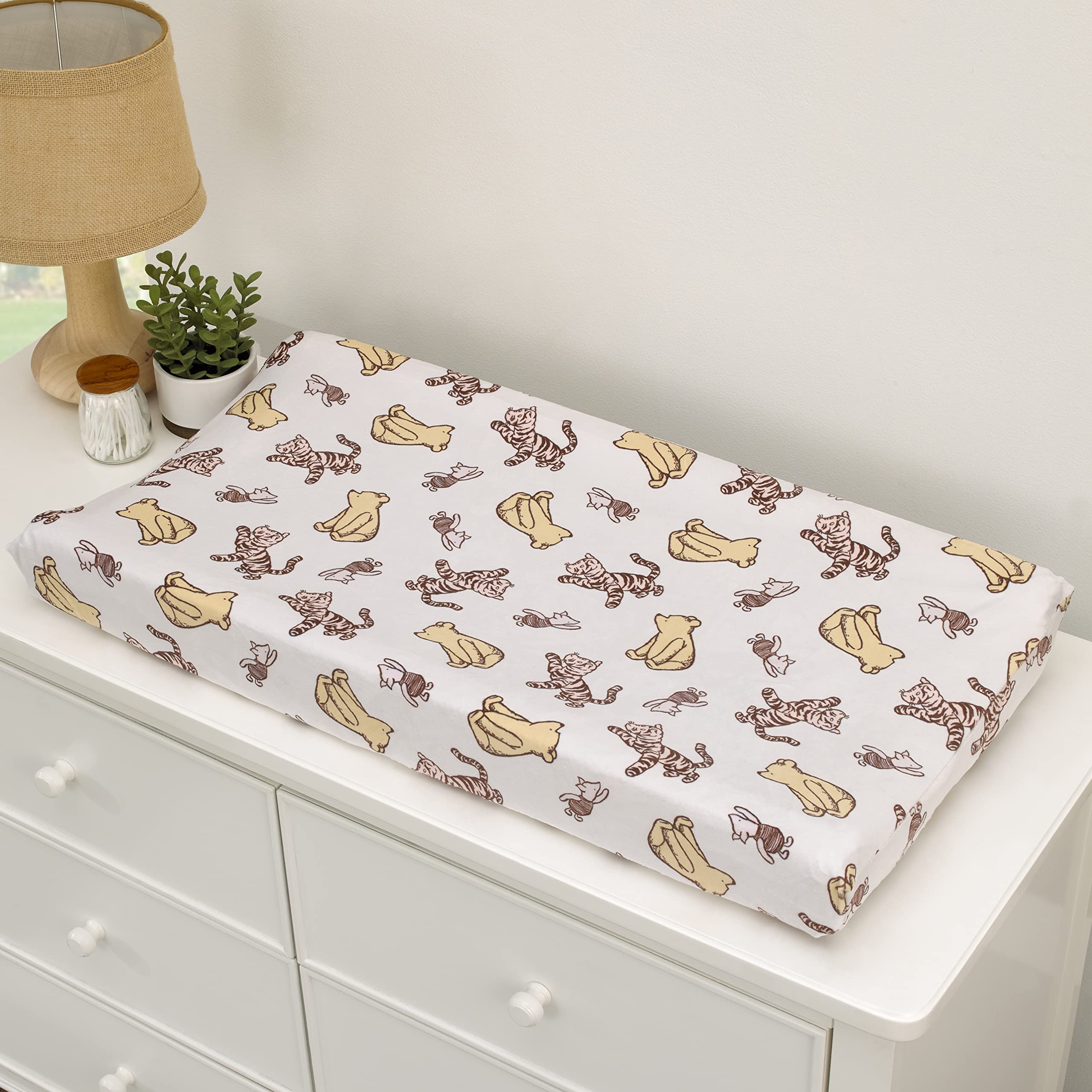 NoJo changing pad cover fits standard contoured pads securely.