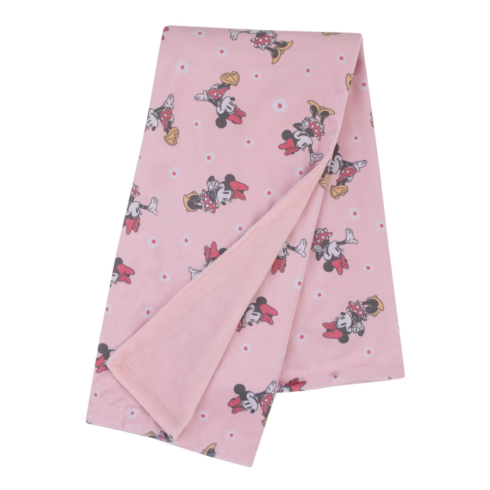 NoJo Minnie Mouse reversible blanket pink sherpa side provides plush warmth