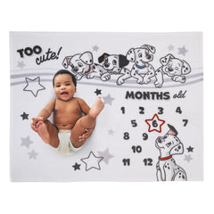 NoJo Disney 101 Dalmatians blanket month-by-month milestone photos document baby's growth.