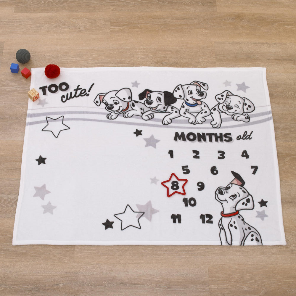 NoJo Disney 101 Dalmatians blanket red accent adds cheerful contrast to photos.
