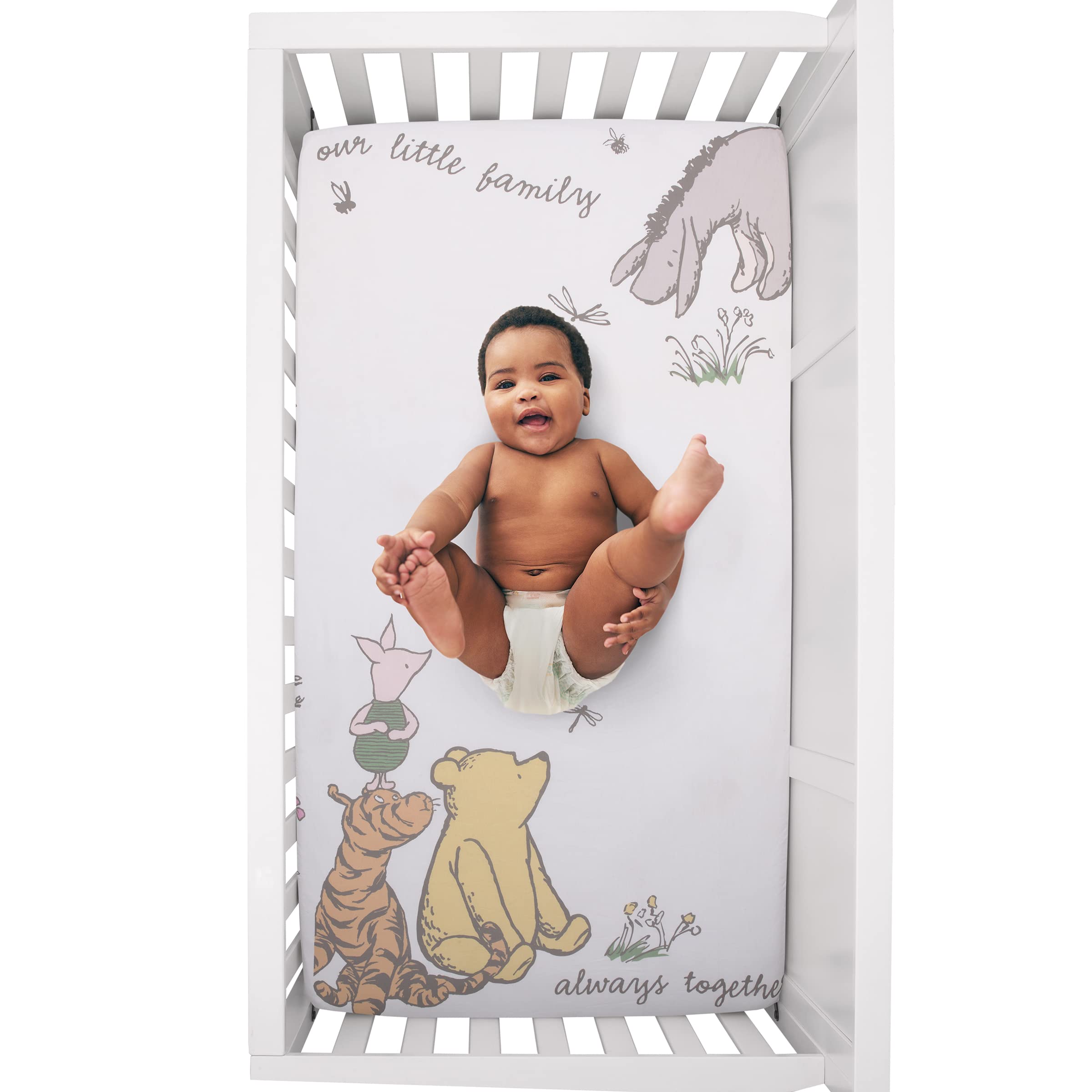 NoJo Pooh ivory-taupe colorway highlights timeless nursery design.
