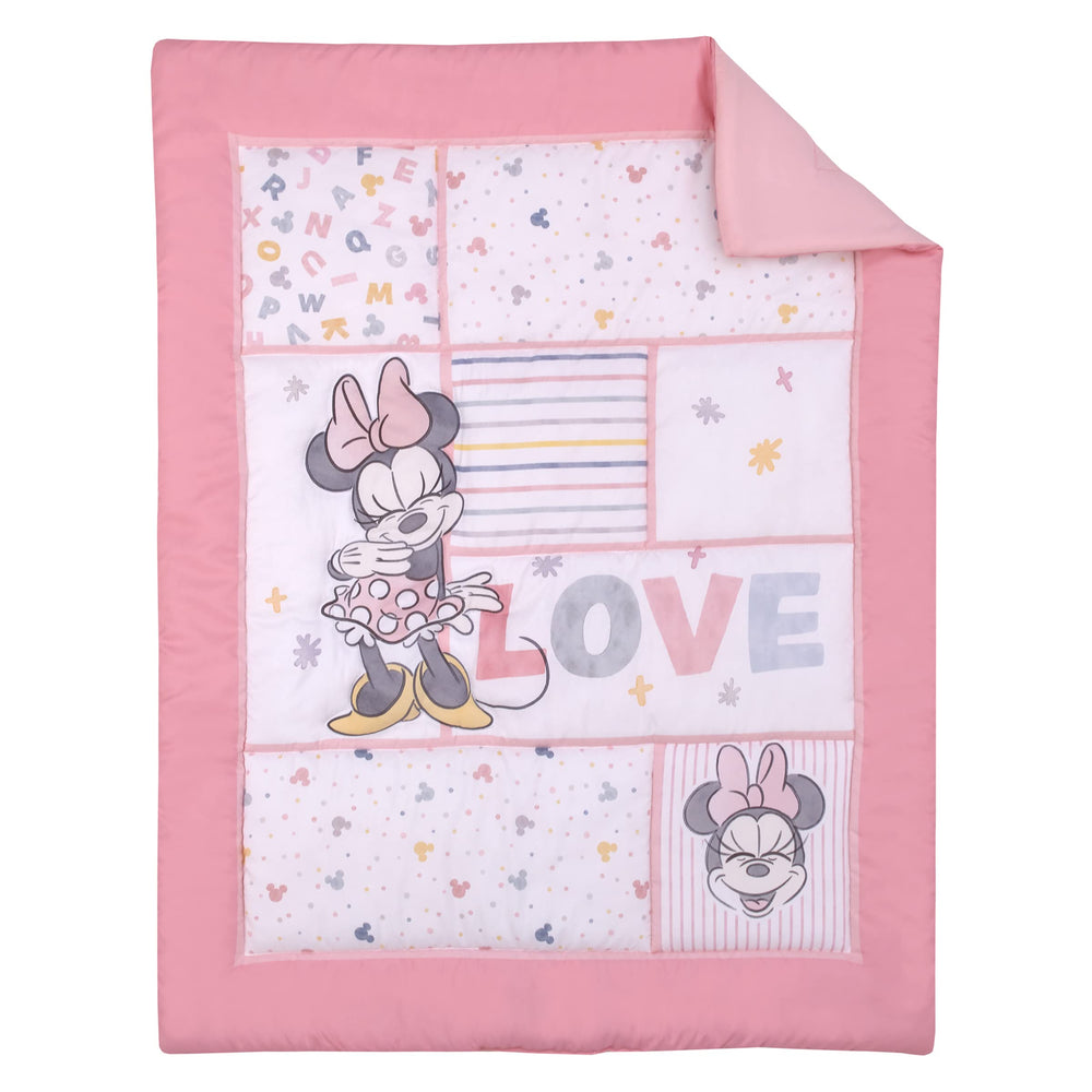 NoJo Minnie Mouse patchwork closeup shows vibrant stripes and dots for nursery charm