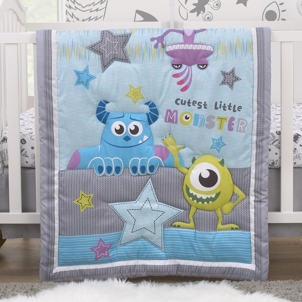 NoJo Monsters Inc nursery setup demonstrating a coordinated themed baby space