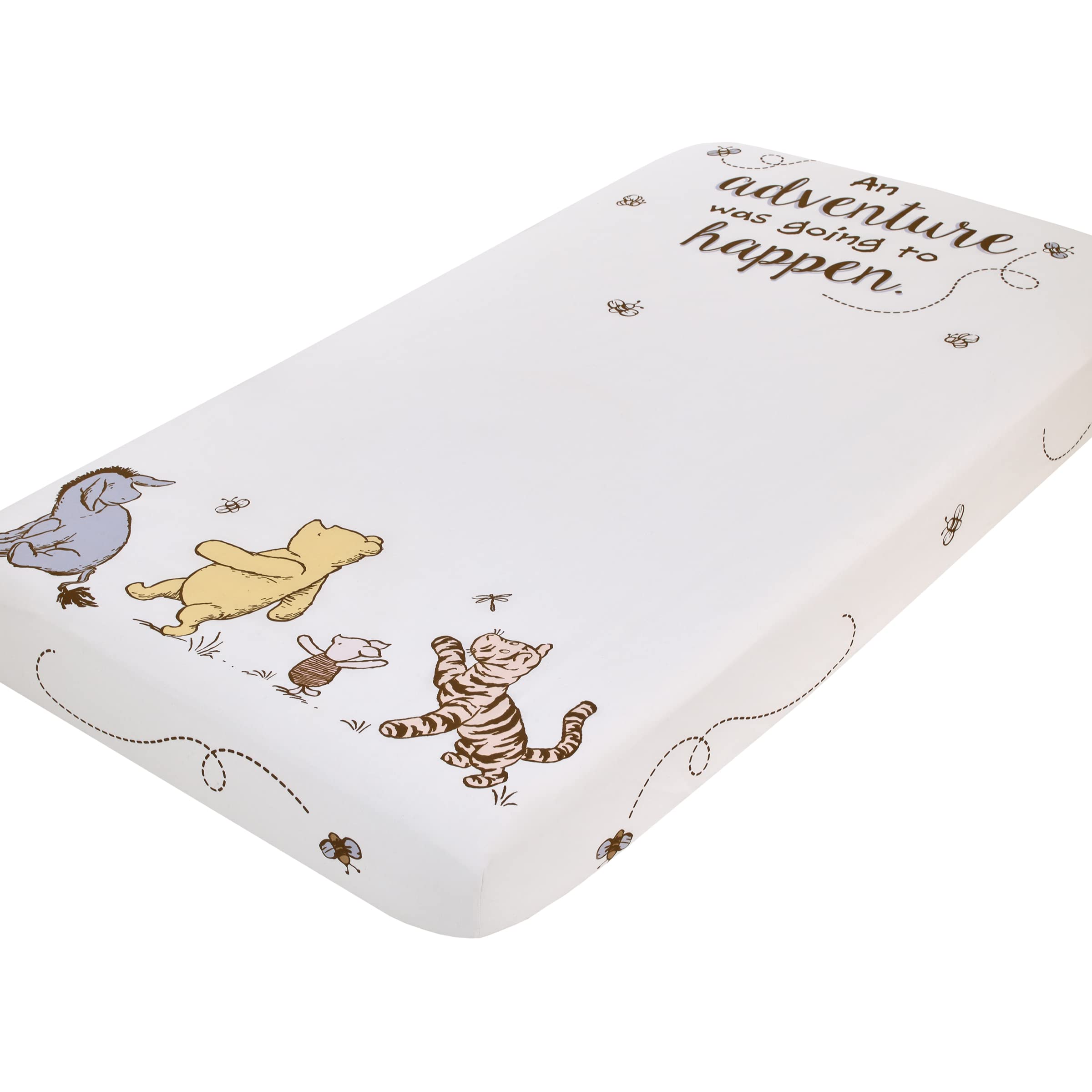 NoJo Disney Pooh Hunny Fun crib sheet on white background with bees, cozy baby sleep surface.