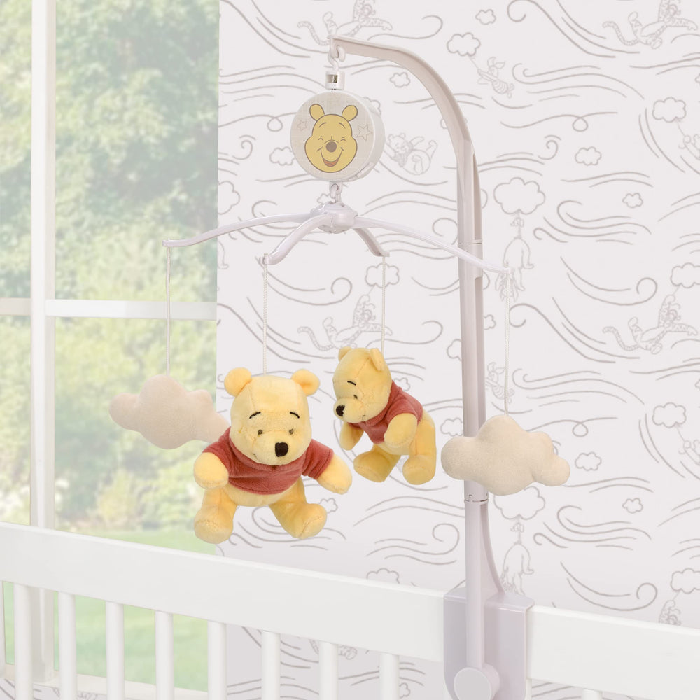 NoJo Winnie the Pooh Blustery Day mobile plush clouds create gentle visual distraction for sleepy babies.