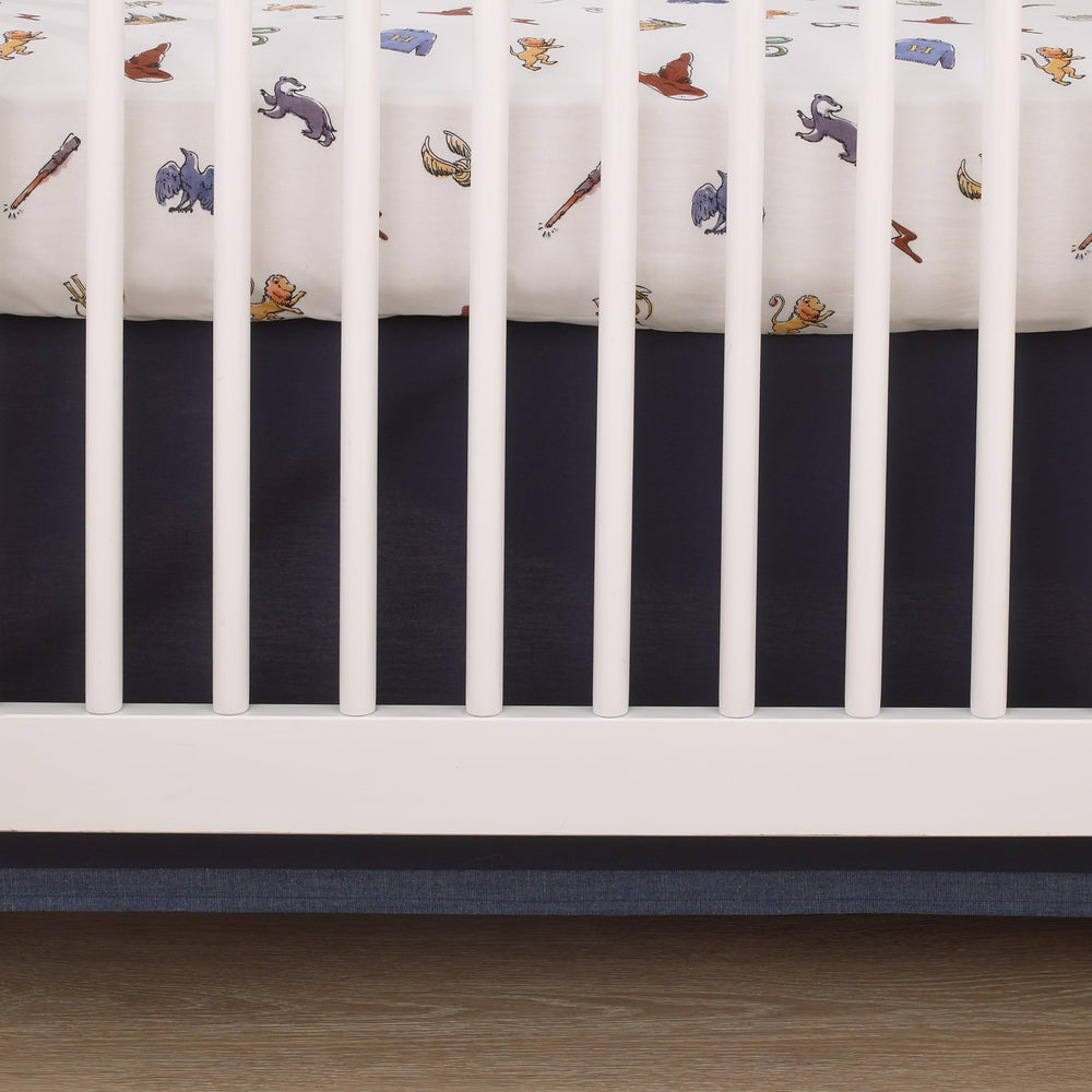 NoJo Harry Potter Welcome Little Wizard crib sheet on standard mattress demonstrates easy-care machine washability.