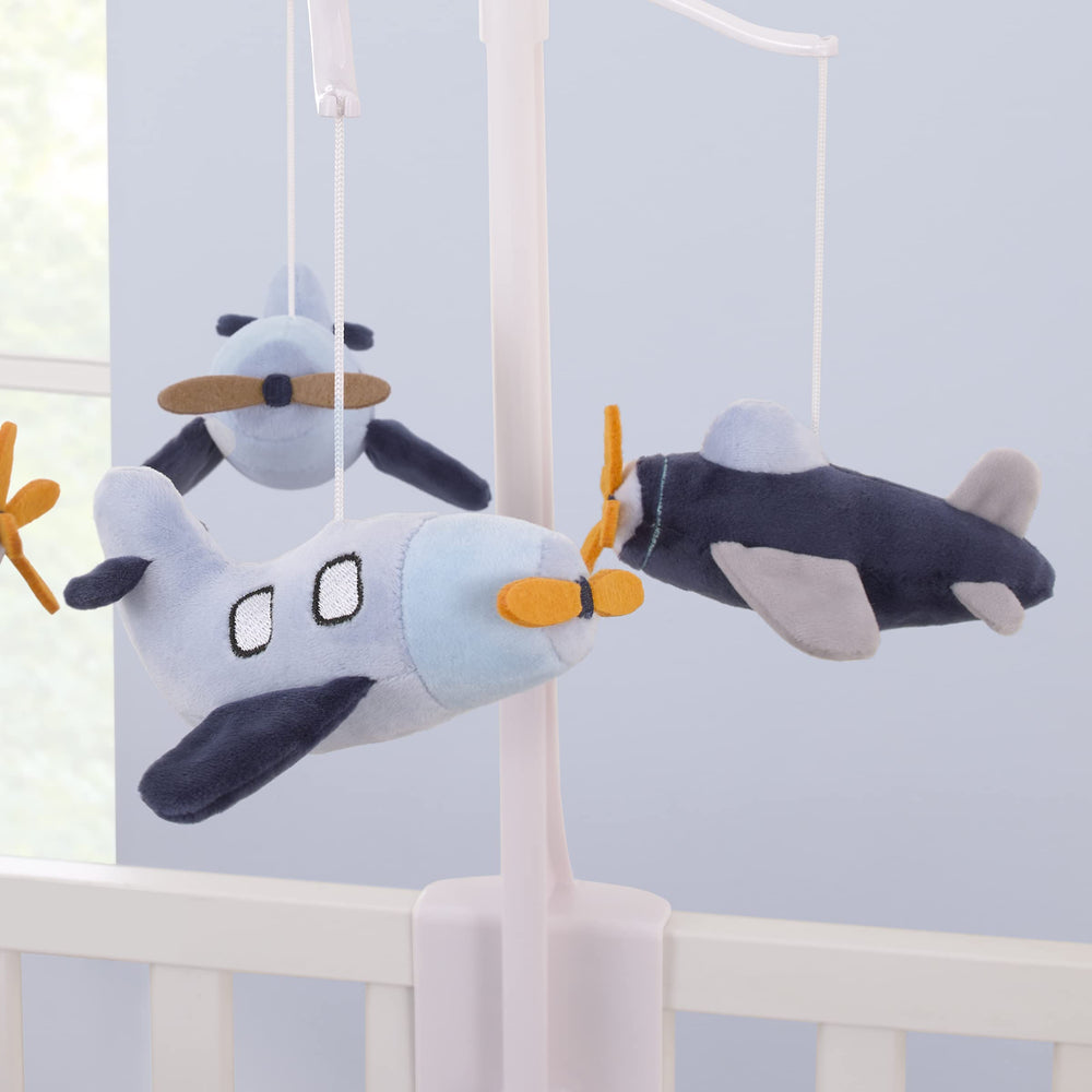 NoJo musical mobile spins gently as baby watches the plush planes in lullaby motion.