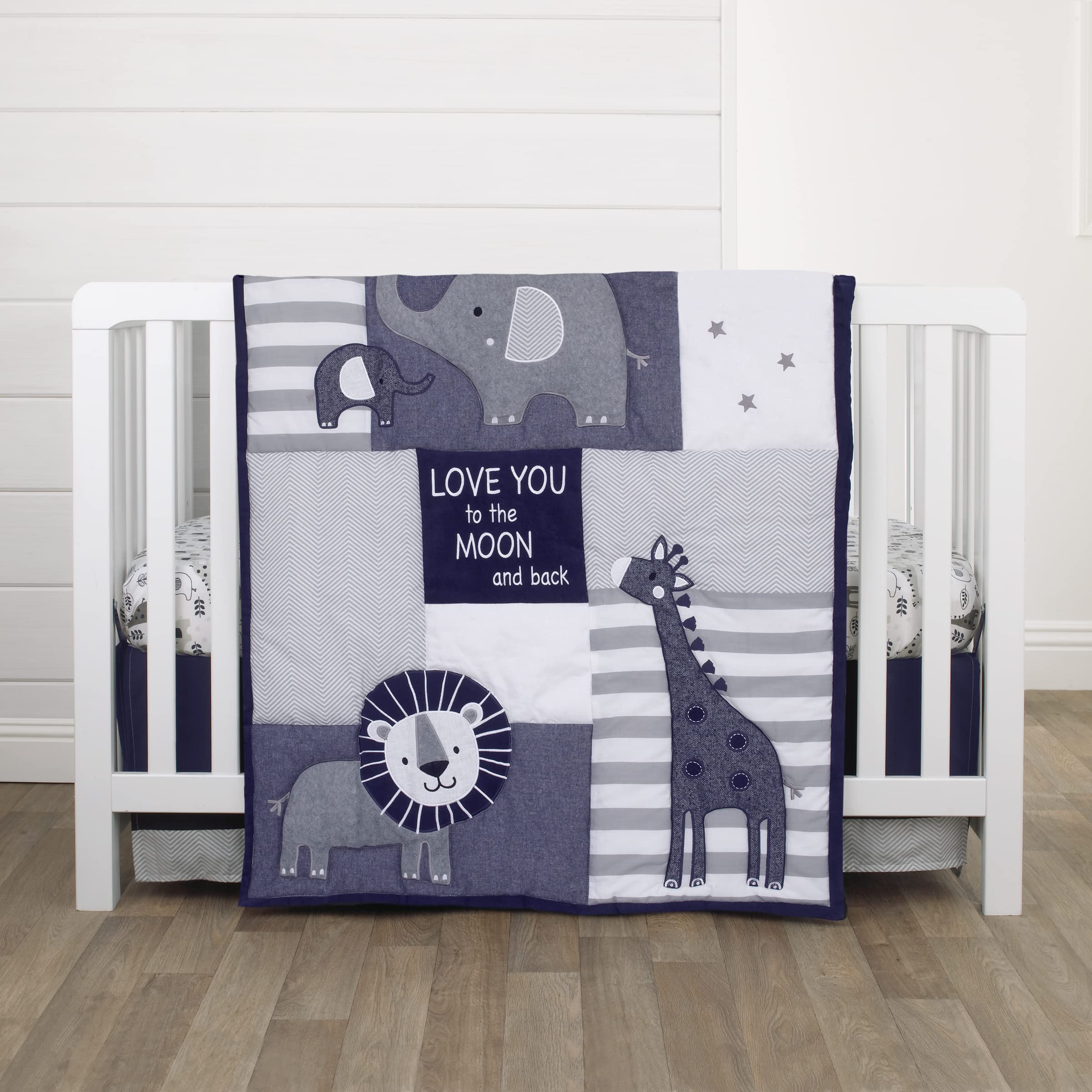 NoJo Love You to the Moon nursery setup shows cohesive styling options