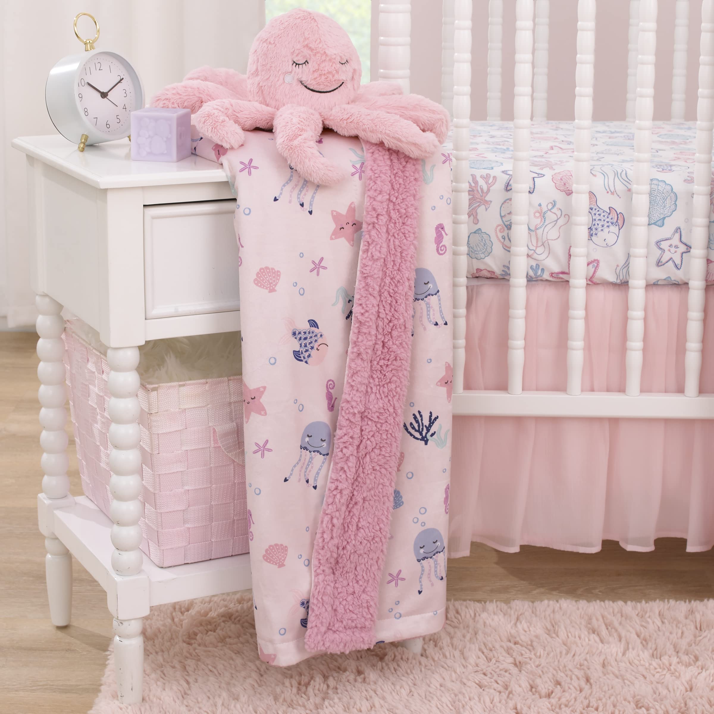 NoJo Mermaid Lagoon blanket in stroller illustrates on-the-go comfort.
